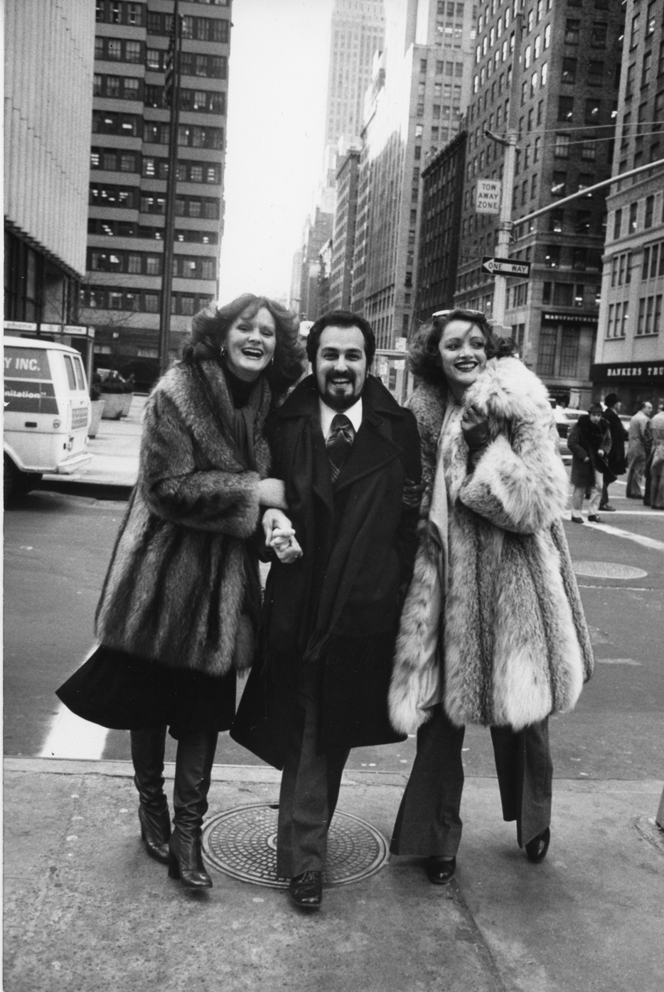 Fashion Designer Albert Capraro with two models on 7th Avenue, New York City 1974